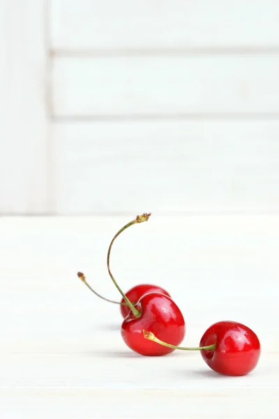 Three little cherries — Stock Photo, Image