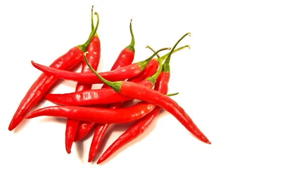 Κόκκινες πιπεριές για τον κατά ένα λευκό — Φωτογραφία Αρχείου