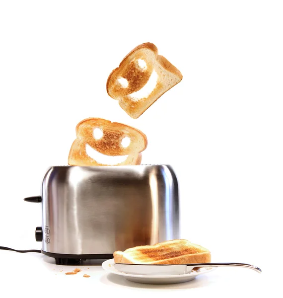 Підсмажений хліб з тостером на білому — стокове фото