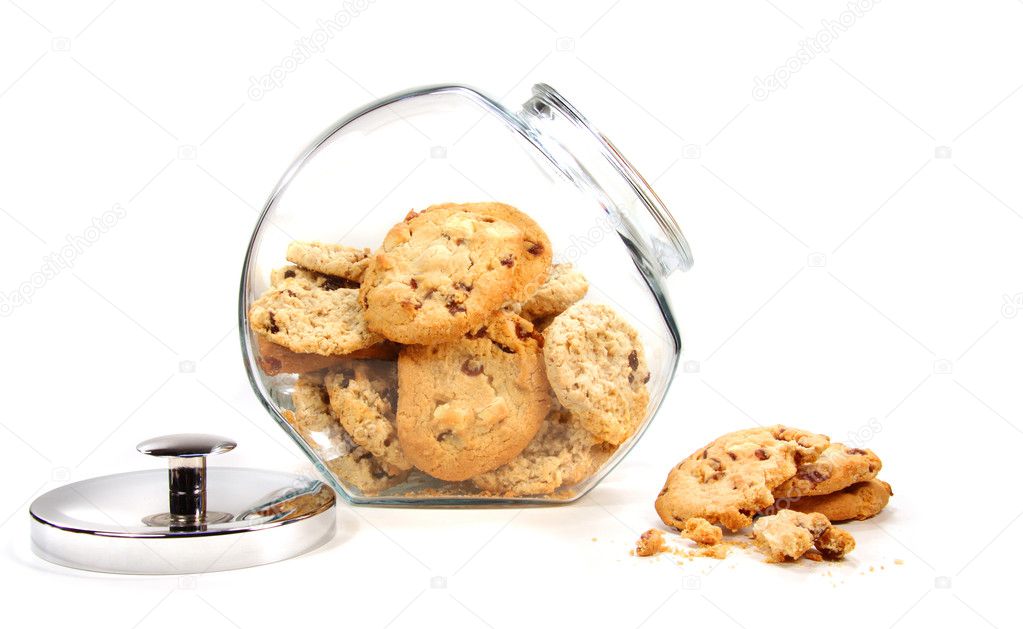 Homemade cookies in glass jar on white