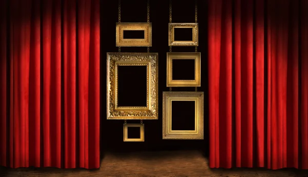 Molduras douradas com cortinas vermelhas — Fotografia de Stock