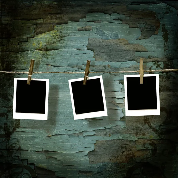 Polaroid pictures against old crackled backdrop — Stock Photo, Image