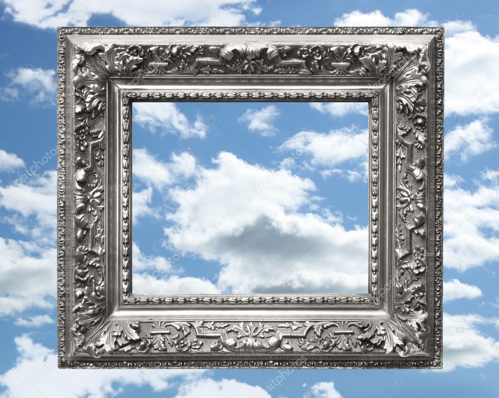 Silver picture frame against a blue sky