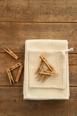 Cotton dish towel with clothes pins clipart