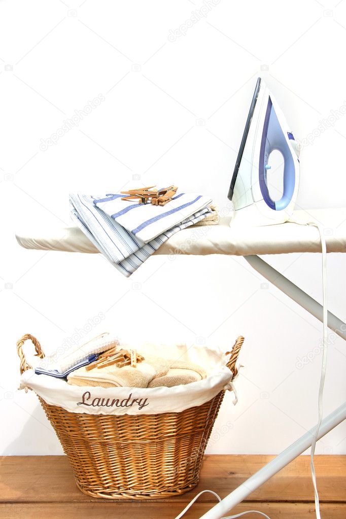 Ironing board with laundry
