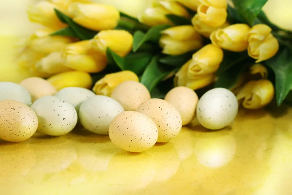 Yellow tulips and Easter eggs — Stock Photo, Image