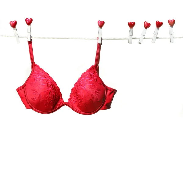 Fantasia reggiseno rosso appeso sulla clothesline — Foto Stock