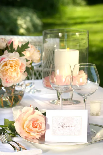 Place setting and card on a table Stock Picture