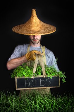 Man with Asian hat gardening clipart