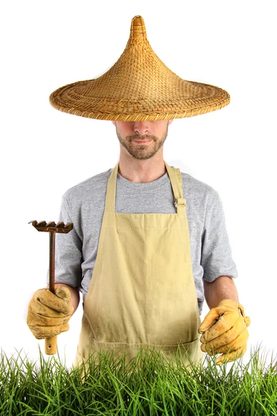 Άνθρωπος με ασιατικές ψάθινο καπέλο — Φωτογραφία Αρχείου