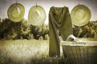 Old grunge photo of jeans and straw hats clipart