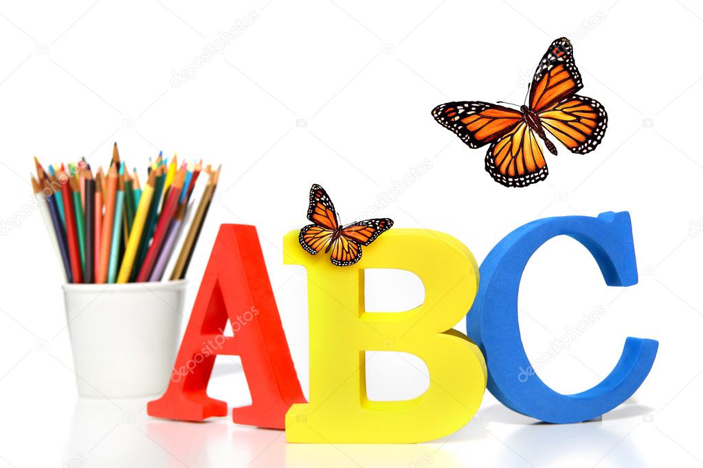 ABC letters with pencils on white