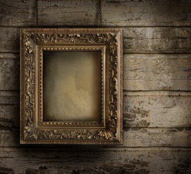 Old frame against a peeling painted wall clipart