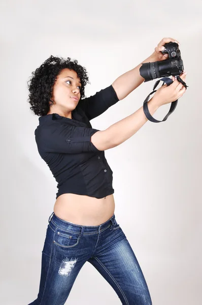 Young girl with camera. — Stock Photo, Image