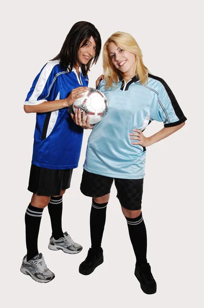 stock image Two soccer girls with ball.