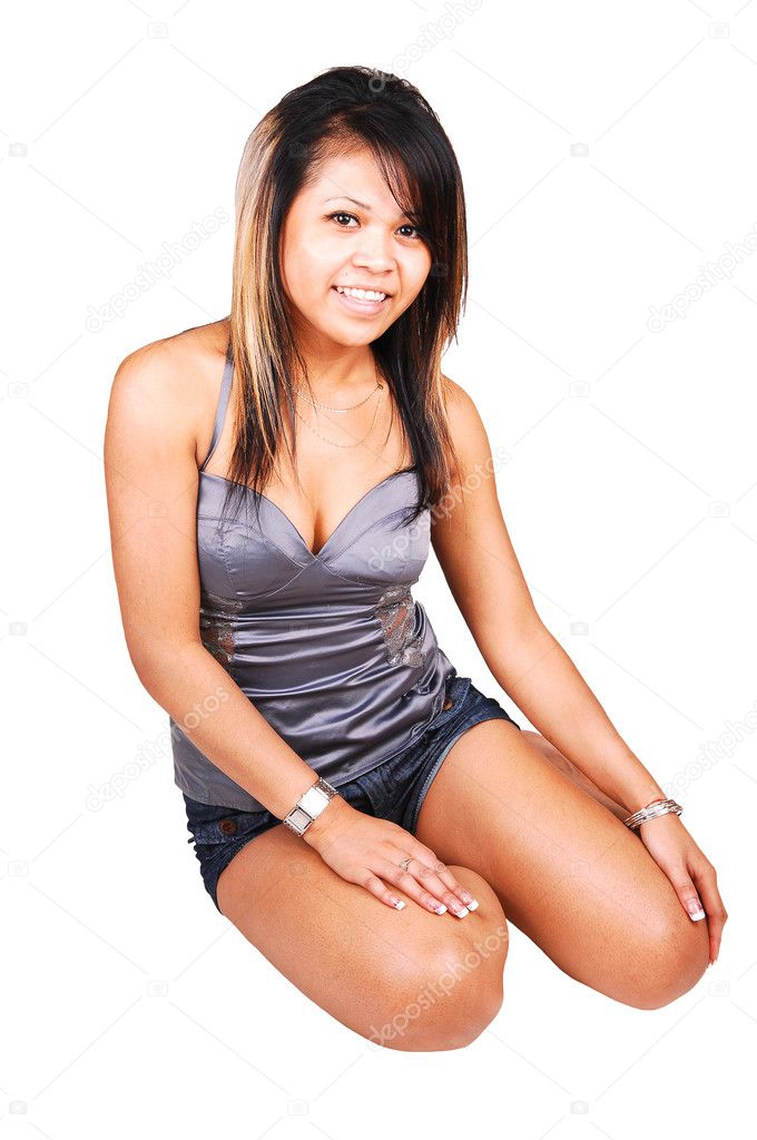 Asian girl sitting on floor. Stock Photo by ©sucher 3352556