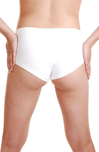 La parte posteriore di una ragazza in un panty bianco . — Foto Stock