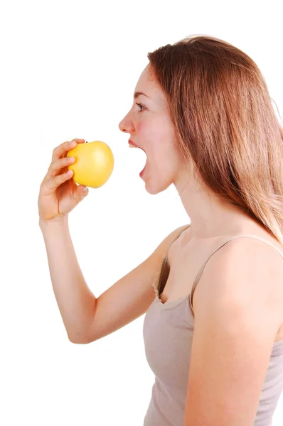 Mädchen isst Apfel. — Stockfoto