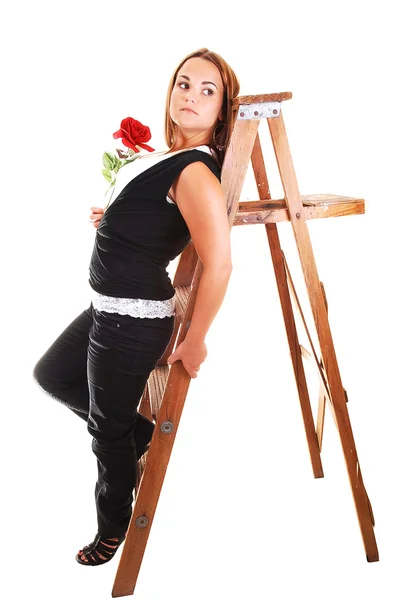 Pretty girl on the stepladder. — Stock Photo, Image