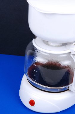 Closeup of white coffee maker. clipart