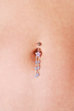 Belly button jewelry. clipart