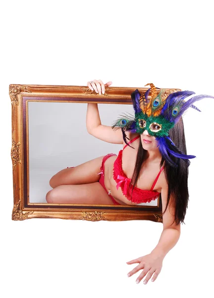Masked woman in picture frame. — Stock Photo, Image
