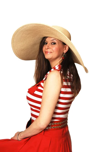Frau in rotem Kleid und Hut. — Stockfoto