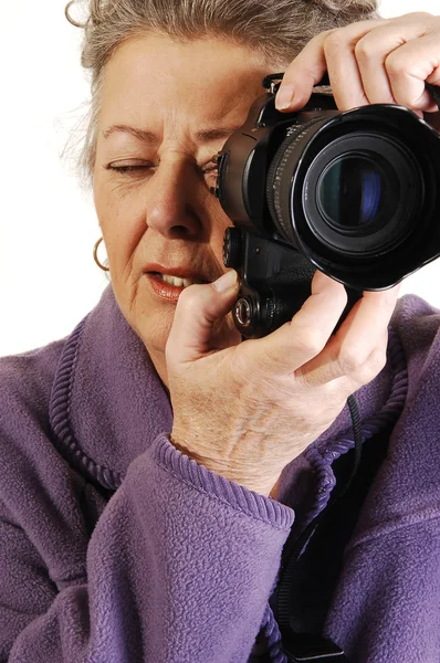 Starší dáma s fotoaparátem. — Stock fotografie