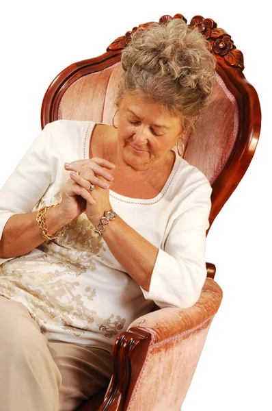 Starší žena se modlí. — Stock fotografie