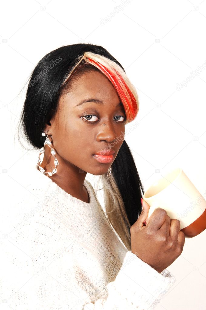 Young Jamaican woman with coffee.