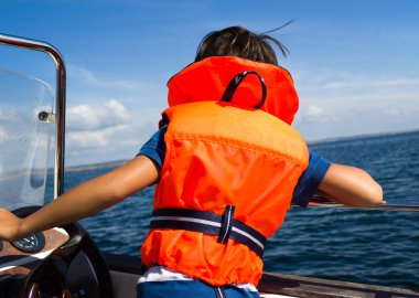 Child with life vest clipart