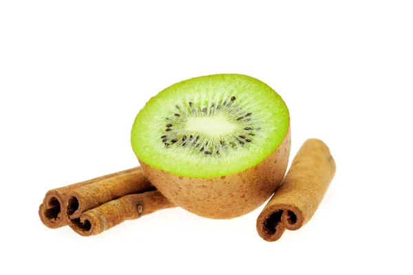 Kiwi and cinnamon isolated on white — Stock Photo, Image