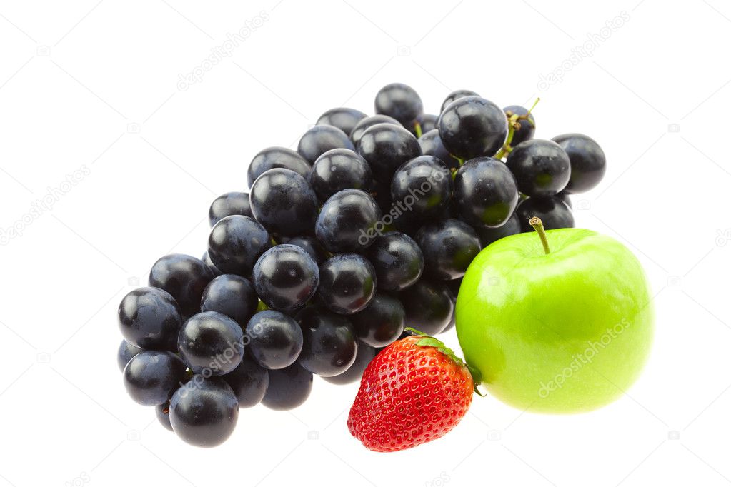 Grapes, strawberries and apple isolated on white