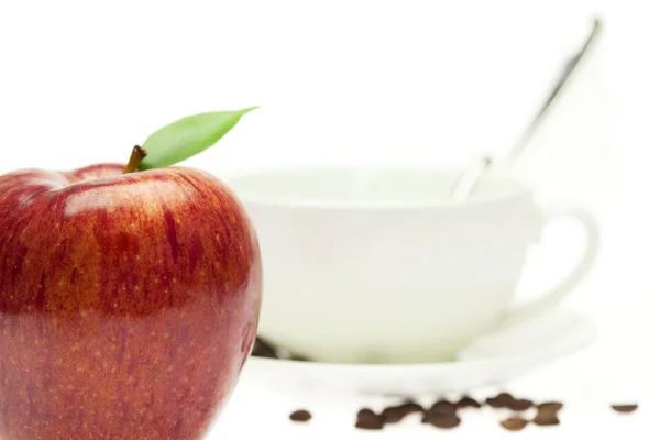Äpple och en kopp — Stockfoto