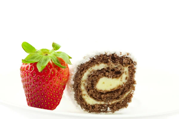Strawberries and cake roll isolated on white — Stock Photo, Image