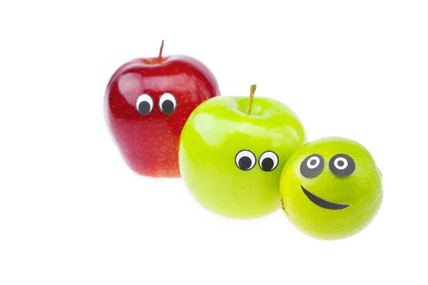 Äpfel mit Gesichtern Freude isoliert auf weiß — Stockfoto