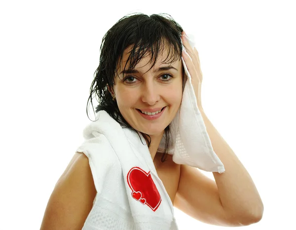 Vrouw in witte handdoek met rood hart — Stockfoto