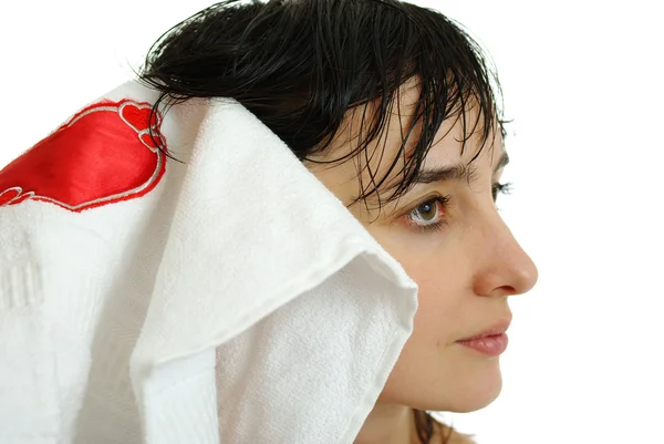 Donna faccia in asciugamano bianco — Foto Stock