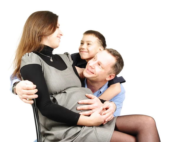 Familia feliz abrazo aislado en blanco — Foto de Stock