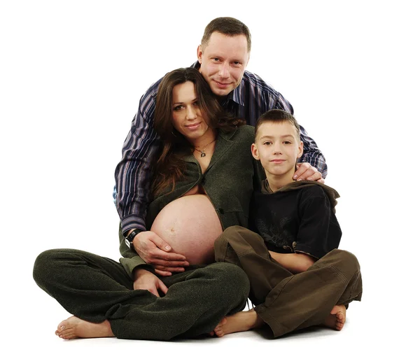 Glückliche Familie umarmt isoliert auf weiß — Stockfoto