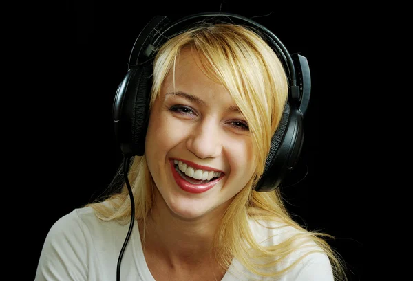 Cheerful laughing blonde girl in headphones — Stock Photo, Image