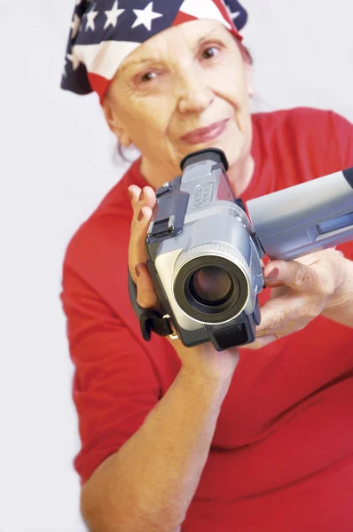 Grandmama with digital camera — Stock Photo, Image