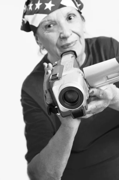Aktywne Cukiernia grandmama z cyfrowy aparat fotograficzny — Zdjęcie stockowe