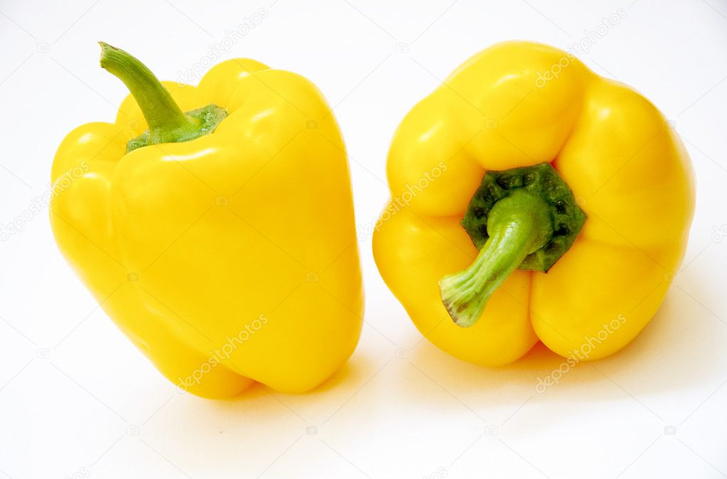 Two yellow bell peppers