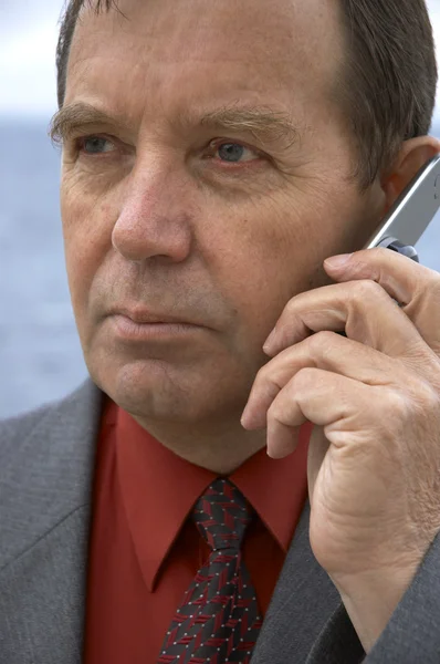 Businessman with cellphone — Stock Photo, Image