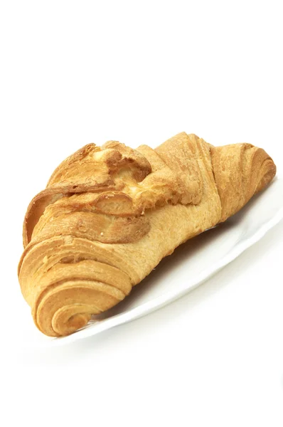 Croissant izolat — Fotografie, imagine de stoc