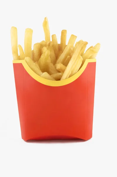 Patatine fritte isolate in scatola di carta rossa — Foto Stock