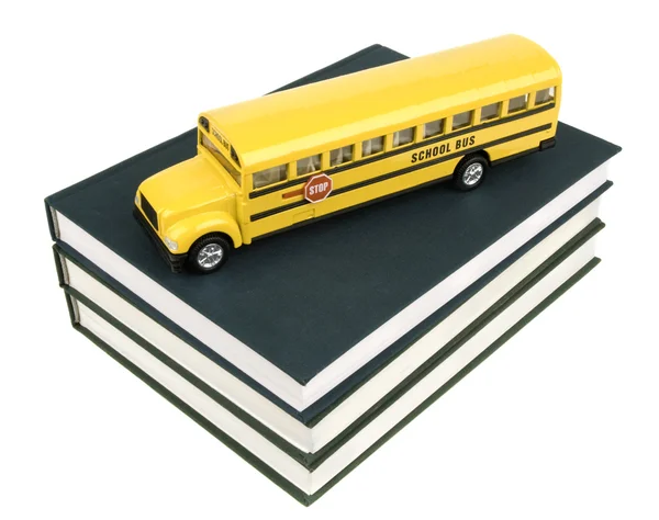 School bus and textbooks — Stock Photo, Image