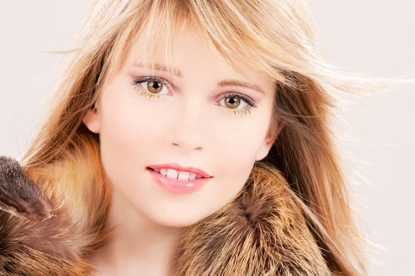 Lovely teenage girl in fur — Stock Photo, Image