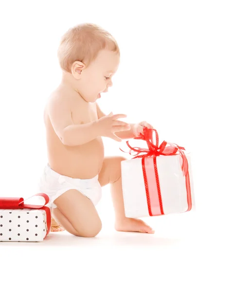 Baby boy with gifts — Stock Photo, Image